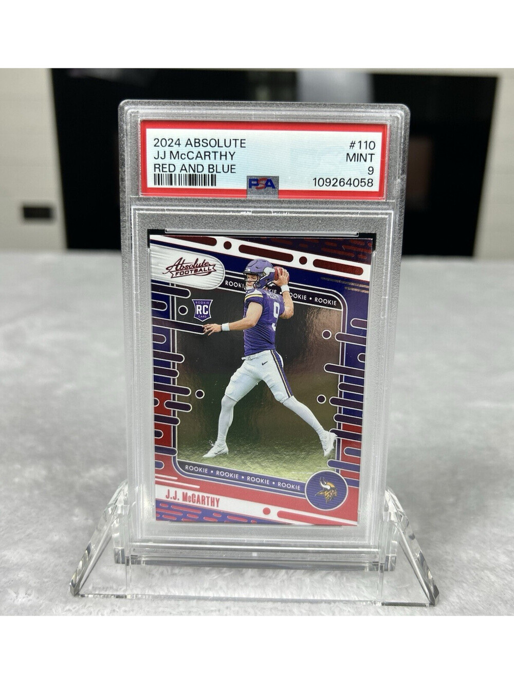 2024 Panini Absolute Rookies J.J. McCarthy Red And Blue #110 (RC) PSA 9 POP 10
